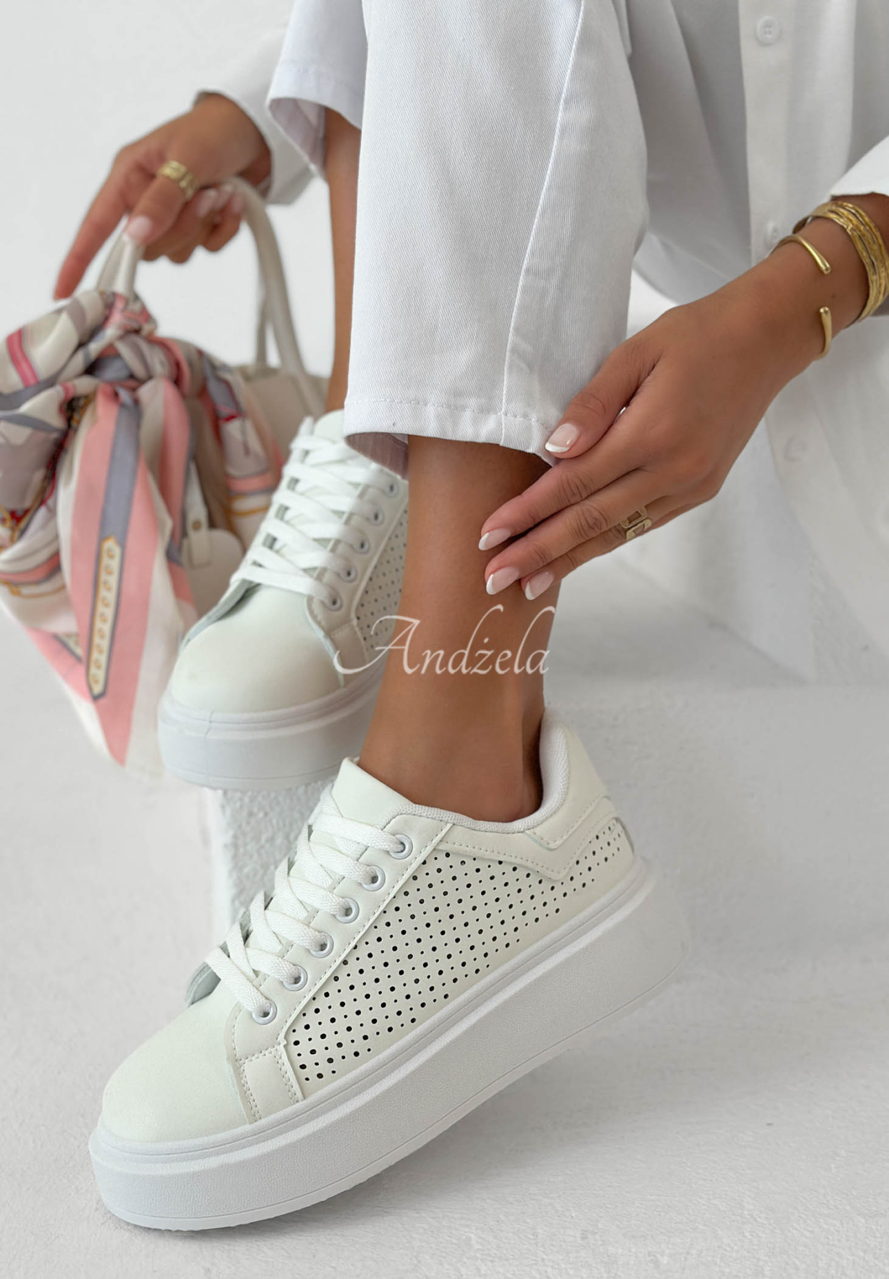 Leather sneakers with openwork patterns from Sun Moves in ecru