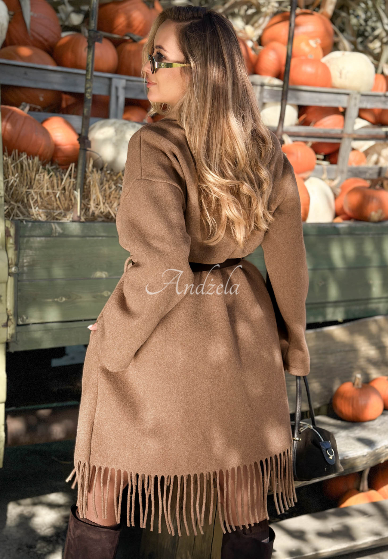 Lightweight wool coat with fringe and a belt by Hazel Grove in camel