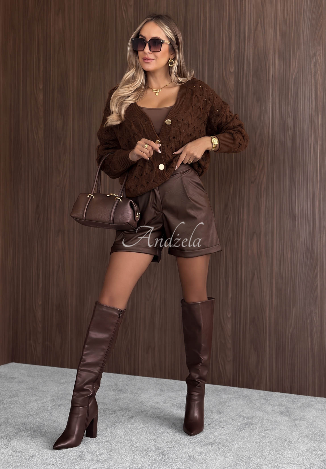 Short openwork cardigan with a front closure by Knit Haven in camel