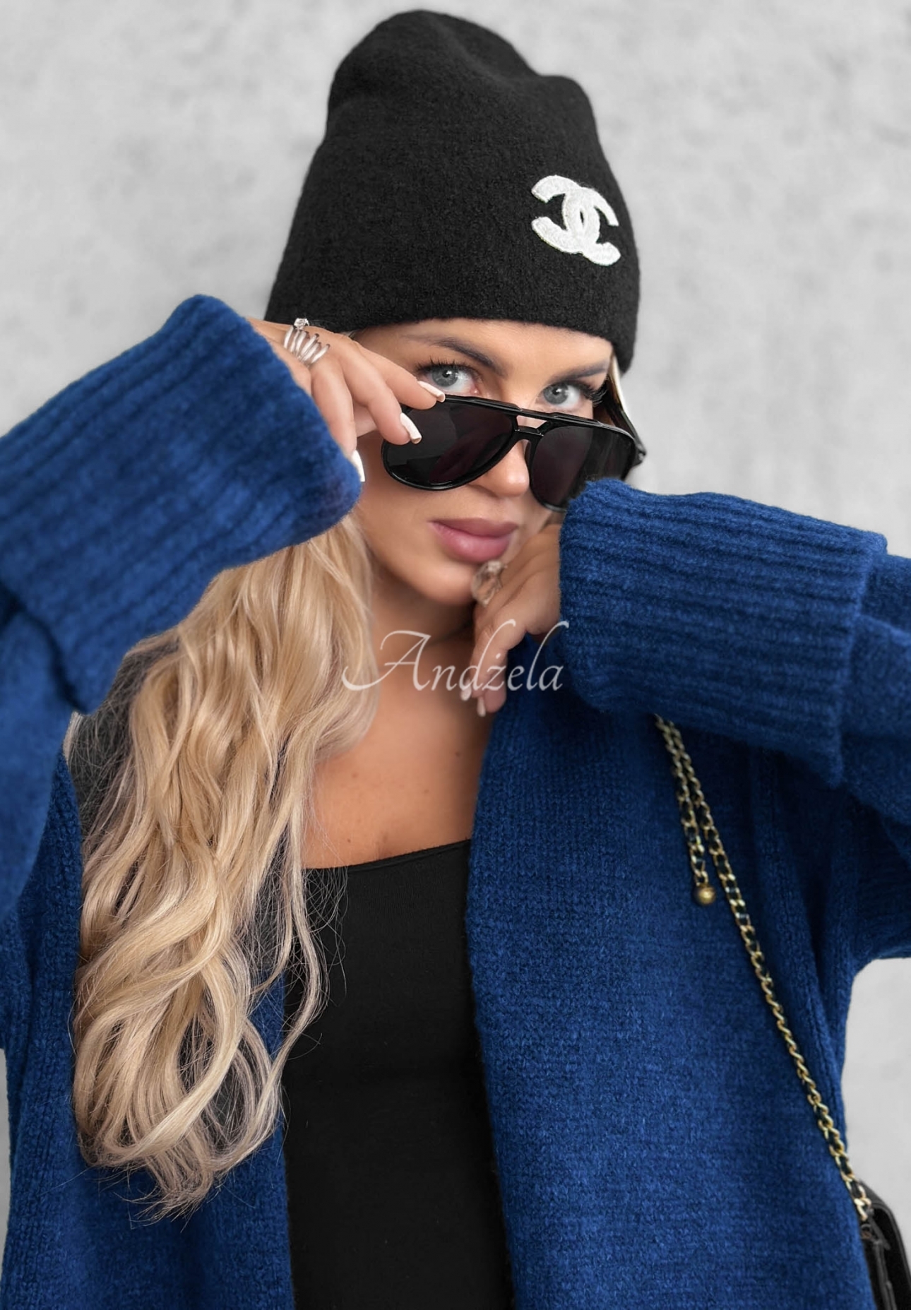 Long, oversized cardigan with pockets, made of Marbelio wool, navy blue